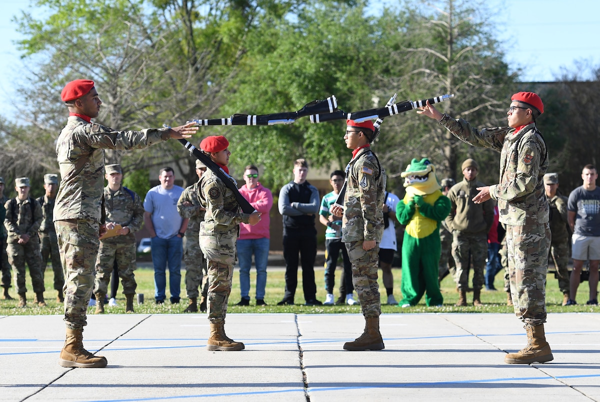 Members of the 335th Training Squadron freestyle drill team perform during the 81st Training Group drill down on the Levitow Training Support Facility drill pad at Keesler Air Force Base, Mississippi, April 1, 2022.